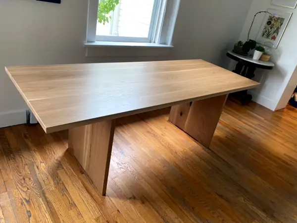 Solid white oak dining table with panel legs